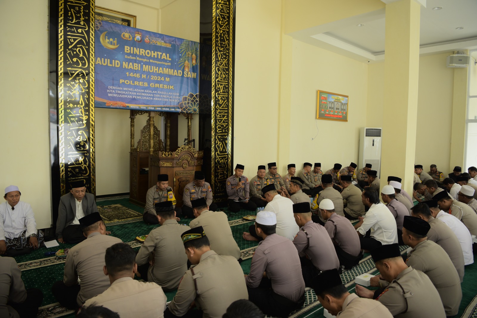 Polres Gresik Ajak Masyarakat Wujudkan Pilkada Damai disela Peringatan Maulid Nabi Muhammad SAW